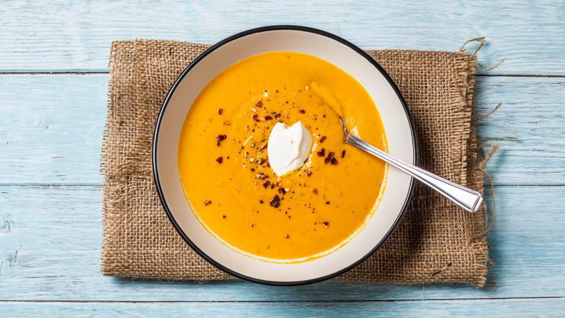 Homemade,Butternut,Squash,And,Chilli,Soup.,Served,With,A,Dollop