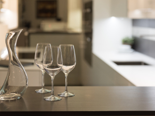 Empty,Glasses,And,Wine,Carafe,In,Stylish,Modern,Kitchen