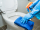 Close,Up,Hands,Women,Wearing,Protect,Glove,Blue,Using,Liquid